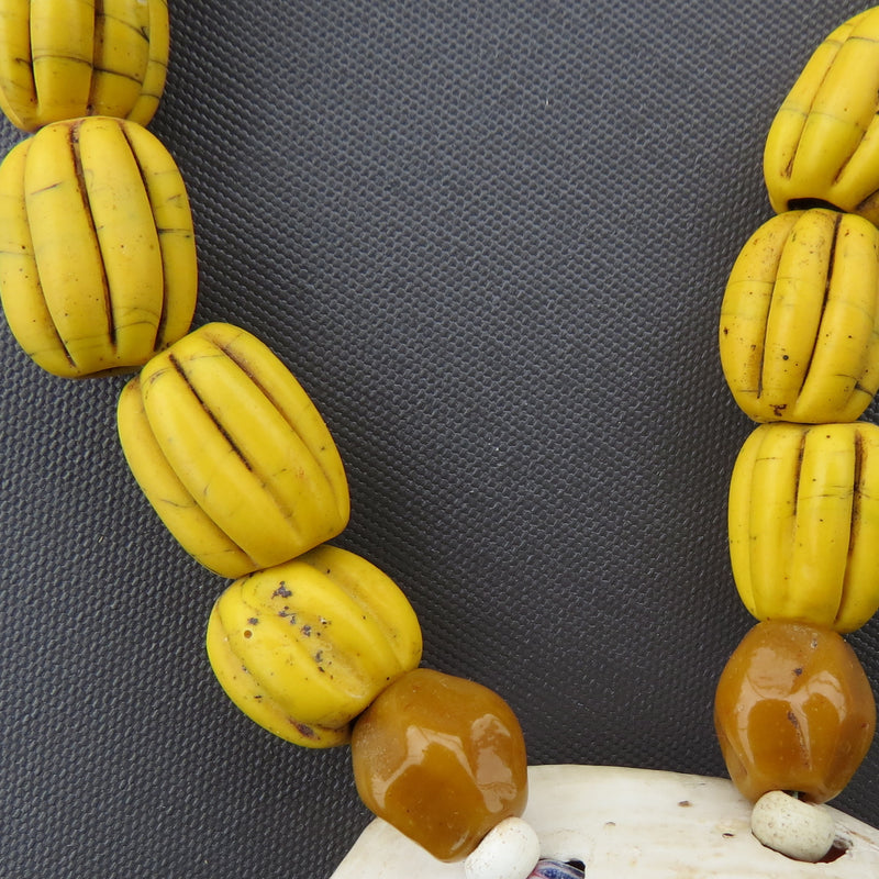 Egg Cowrie and yellow melon beads-Tasmanian Jewellery and gemstones-Rare and Beautiful