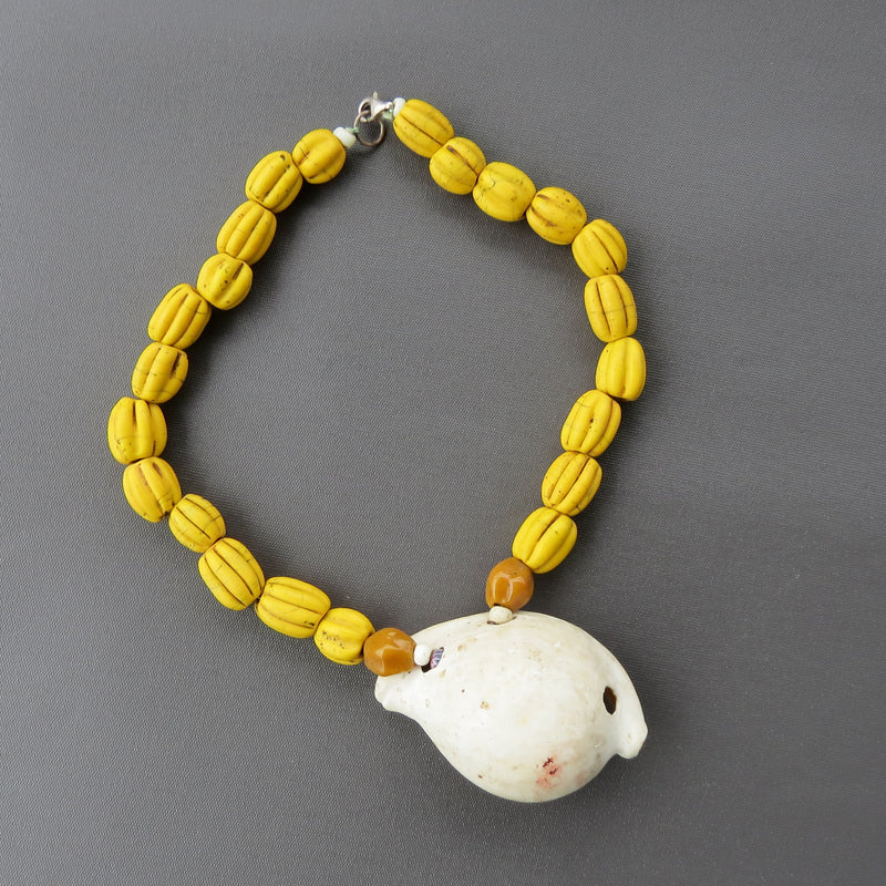 Egg Cowrie and yellow melon beads-Tasmanian Jewellery and gemstones-Rare and Beautiful